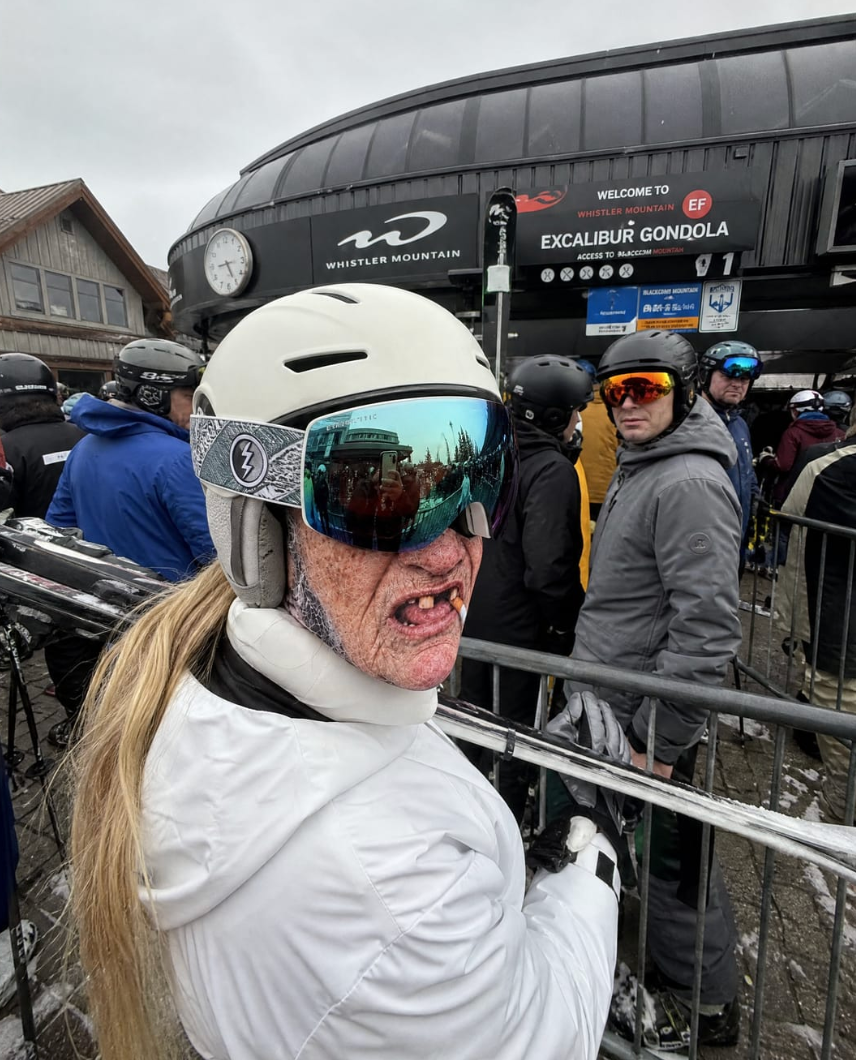 Printed ski mask worn with goggles at the gondola